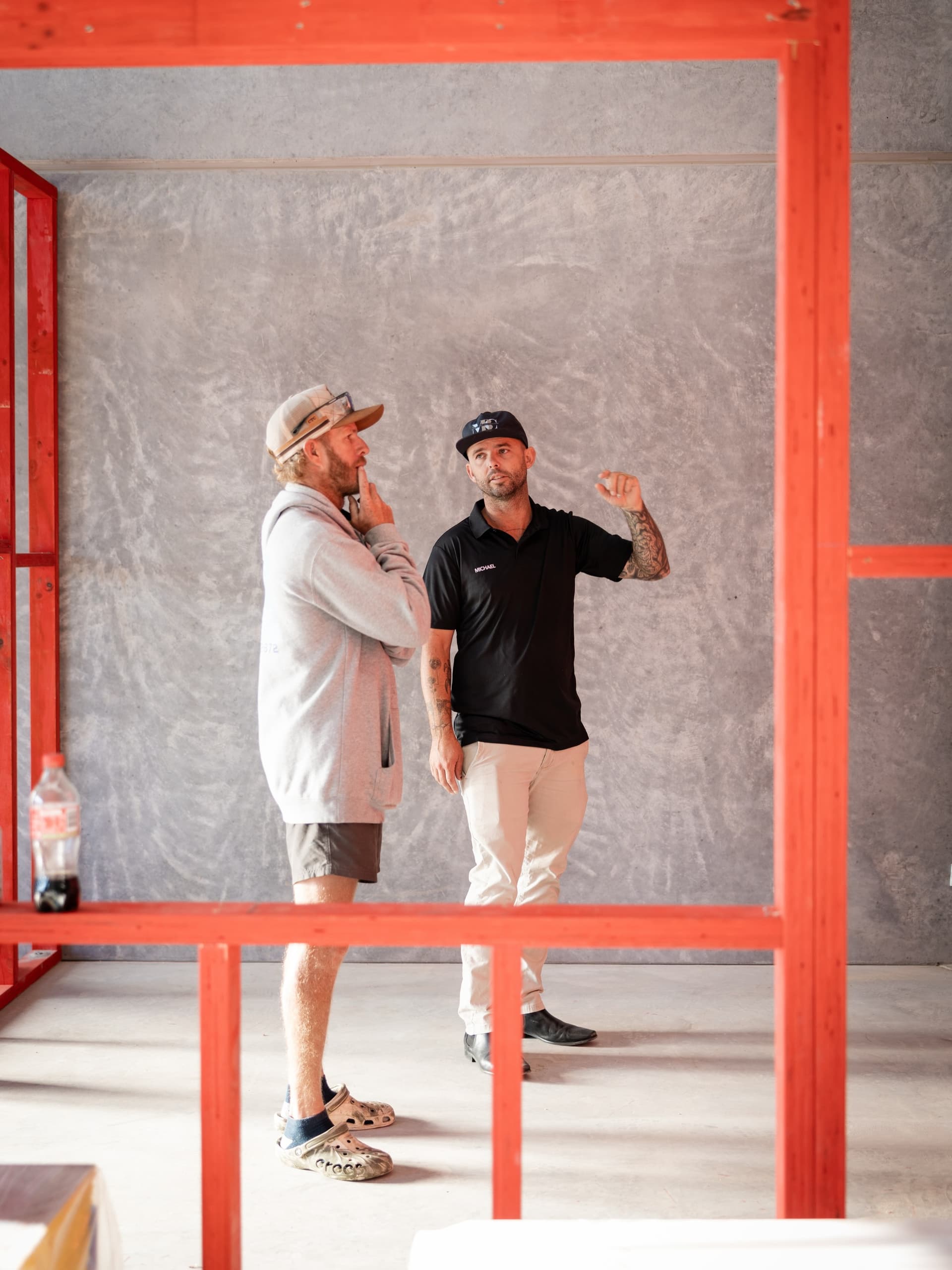 Michael Bell on site, directing a build in progress