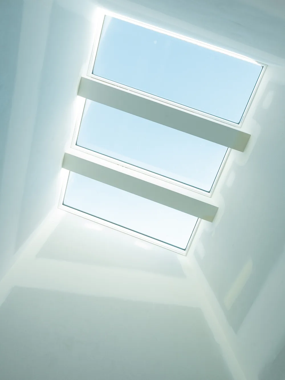 Three-panel skylight set into a raked ceiling, Newcastle renovation by MBC